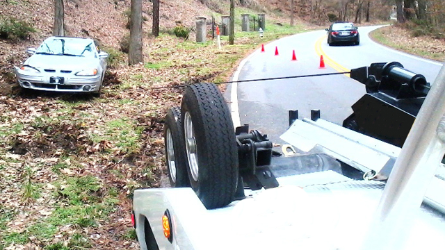 Tow Truck service Winching out of ditch