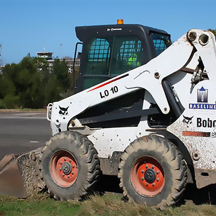 AER Towing Jumpstart Service Miami Skid Steer on the side of a road